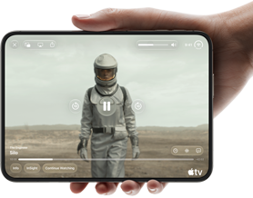 iPhone Duo, held with one hand, opened in horizontal orientation, fully unfolded, interior screen displays Apple TV show
